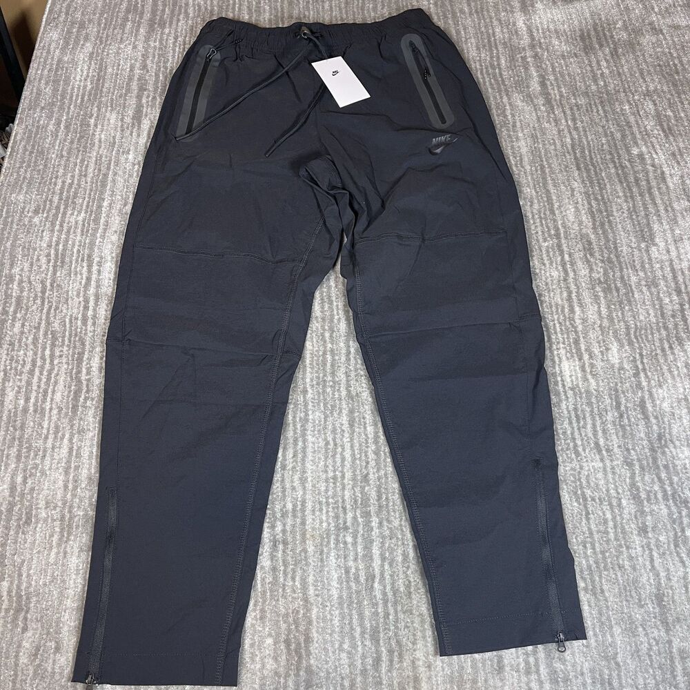 Nike Tech Woven Pants Mens Medium Black Standard Fit Taper Leg Zip HM8241-010